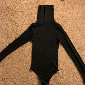 Vici Sweaters - VERSATILE RIBBED TURTLENECK BODYSUIT - BLACK Vici Sweaters - VERSATILE RIBBED TURTLENECK BODYSUIT - BLACK
